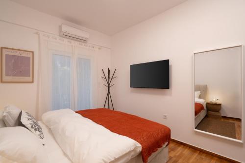 Cozy & Stylish 2BR Home Near Kallimarmaro - image 2
