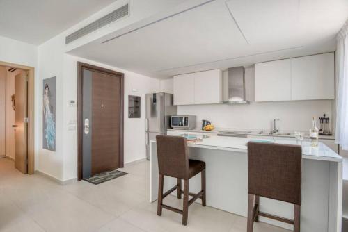 Kitchen, Canvas 2-Bedroom Apt in AquaGate Resort Tabarja in Wata Slam