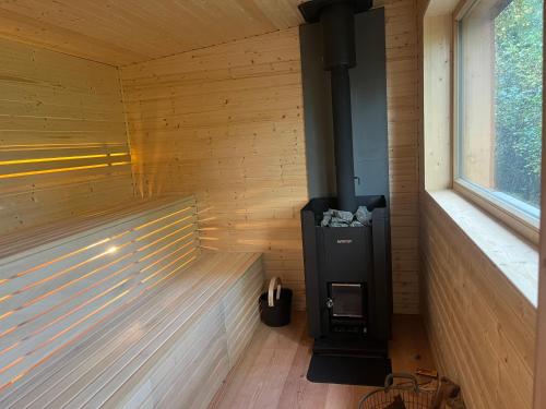 Sauna, Landbahnhof Buschhof 1 OG, mit Gartensauna in Schwarz