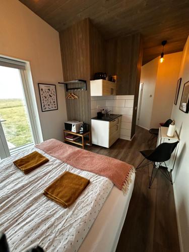 Hamar - Puffin Cottages & Rooms in Budarholshverfi