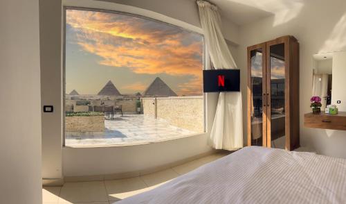 Point Pyramids View, Il Cairo