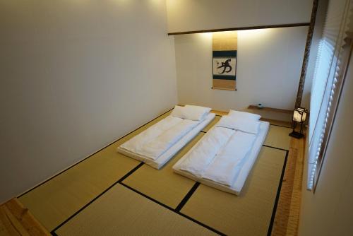 Japanese-Style Deluxe Room with Shared Bathroom and Private Toilet