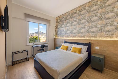 Tra i vicoli del centro Oro e Malva