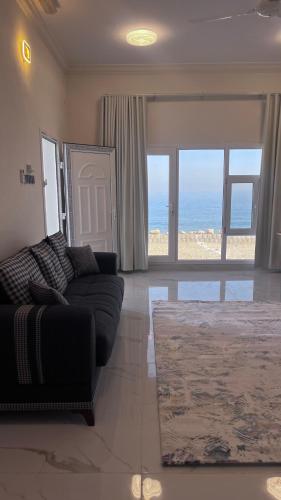 Al Tasnem Beach in طيوي