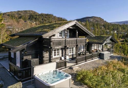 Viesnīcas āriene, Family Cabin With Jacuzzi At Tempelseter in Egedala