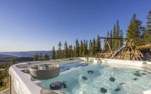 Viesnīcas āriene, Family Cabin With Jacuzzi At Tempelseter in Egedala