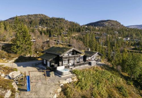 Viesnīcas āriene, Family Cabin With Jacuzzi At Tempelseter in Egedala