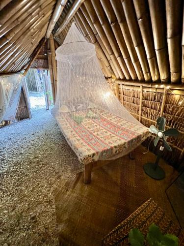 Tribal Huts Community Room Type - Single Room with Private External Bathroom