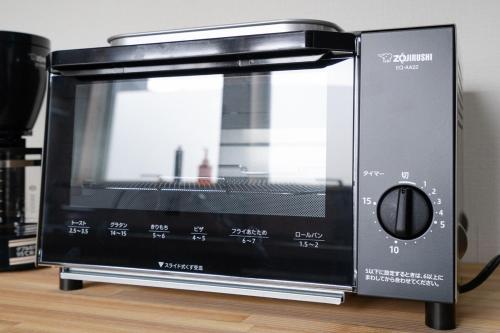 海を眺めて暮らすように滞在する露天風呂付き一軒家