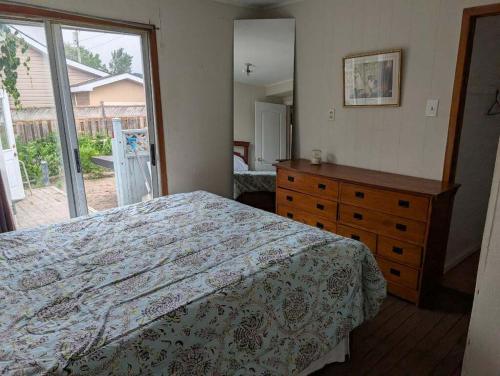 . 4BDR Beachfront Retreat with a Hot Tub & Wraparound Deck
