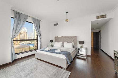 VayK - Spacious 3BR in JBR with Beach Access - image 10