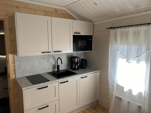 Piilopirtin Lomamökit (Piilopirtin Lomamokit) in โออูลู