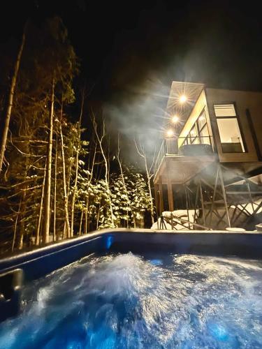 Chalet MonVue - Serenity in the Heart of Nature in 聖阿爾方斯 • 羅德里格斯 (QC)