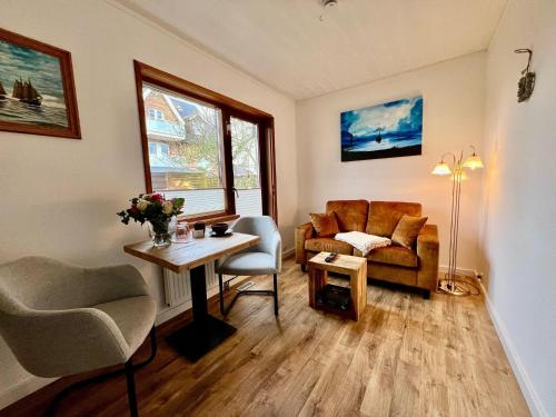 Kapitaenshaus-Lassen-Zimmer-Nes-Puek - Neukirchen Kapitaenshaus-Lassen-Zimmer-Nes-Puek - Neukirchen