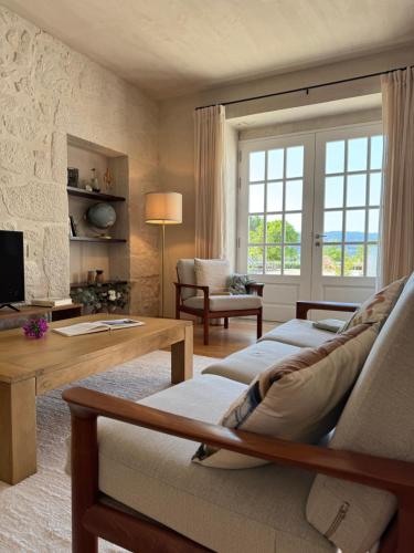 ห้องส่วนกลางสำหรับนั่งเล่น/ดูทีวี, As Casinhas, Slow Living in Minho Quinta in ลาเญส