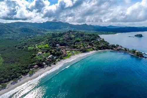 Modern Oceanfront Condo with a Chic Coastal Design Resort-Style Amenities and Direct Beach Access - image 4