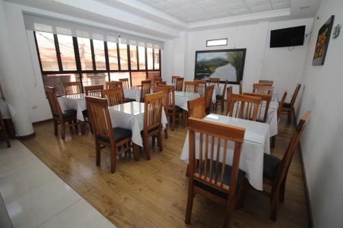 Koplietošanas atpūtas telpa ar TV, HOTEL NOGAL PLAZA in La Virginia