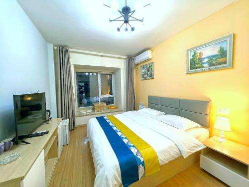 Qingdao Mi Apartment in Кингдао