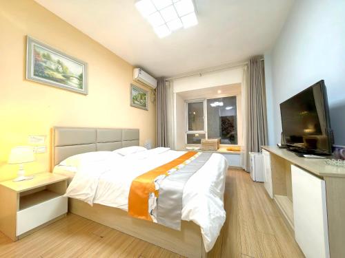 Qingdao Mi Apartment in Кингдао