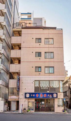 台東区寝室4つと広々吹き抜けリビングのメゾネットタイプのお家