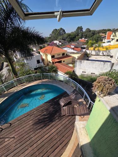 Suíte privativa em casa compartilhada (Suite privativa em casa compartilhada) in サン ドミンゴス