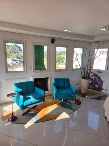 Suíte privativa em casa compartilhada (Suite privativa em casa compartilhada) in サン ドミンゴス
