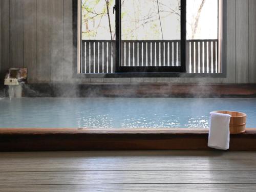 Баня на открито, Komakusa Hotel in Norikura