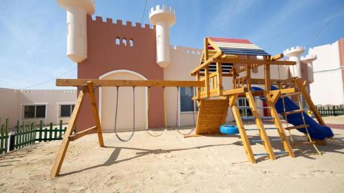 Zajednički dnevni boravak / prostorija s TV-om, Oyster Bay Beach Suites  in Qesm Marsa Alam