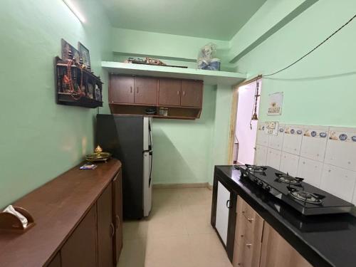 Kitchen, ShivSangit 2bhk Flat Homestay in Ponda