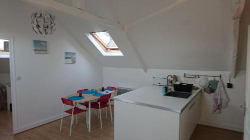 Un nid cosy sous les toits in 康卡爾