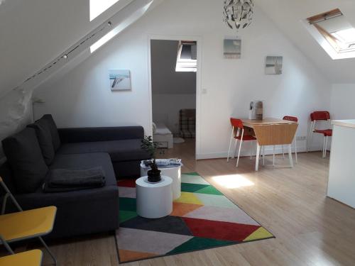 Un nid cosy sous les toits in 康卡爾