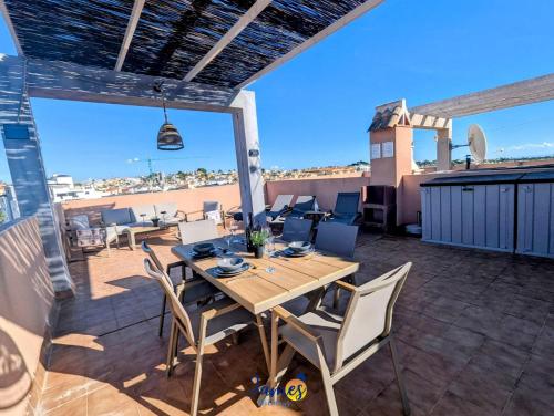 Sunny Getaway with Pool & Rooftop Views VM77 - image 5