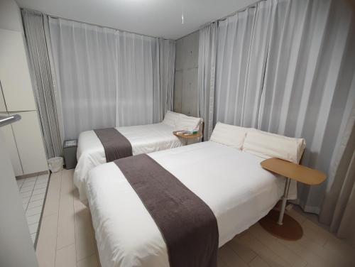 101Room,7-minute walk from Uguisudani Station located on the 1nd floor of an apartment-style building Twin room No elevator