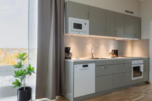 Cocina, Forenom Aparthotel Luleå Västra Stranden (Forenom Aparthotel Lulea Vastra Stranden) in Lulea