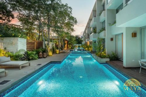 NHOA 103A Lux 2BR Condo Pool access in Aldea Zama