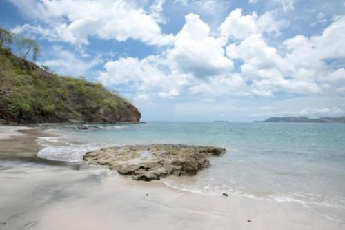 Oceanview Studio Apartment with Community Pool & Views of Flamingo Marina in Playa Flamingo