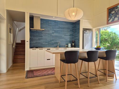 Seaside Serenity - Prime Beachfront Position in Great Barrier Island