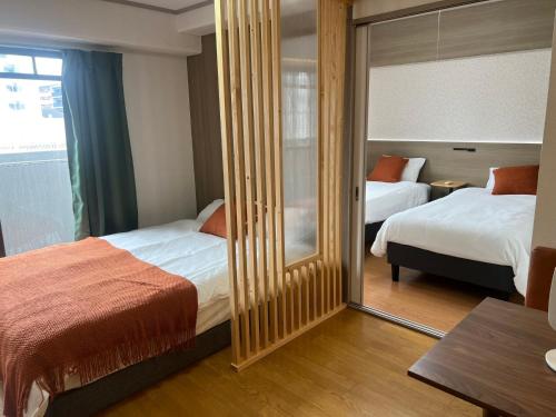 Two bedroom Osaka guesthouse accommodating 3 5 people