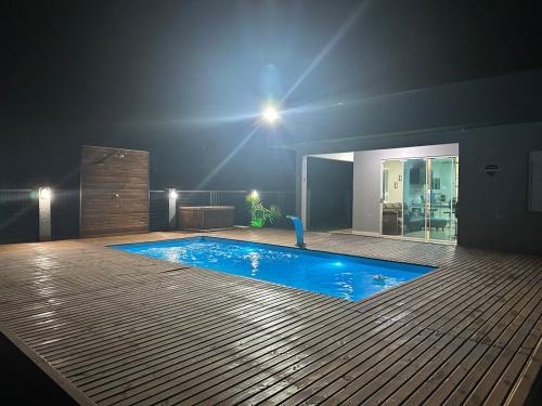 Kilátás, Casa de praia com piscina in Arroio do Sal