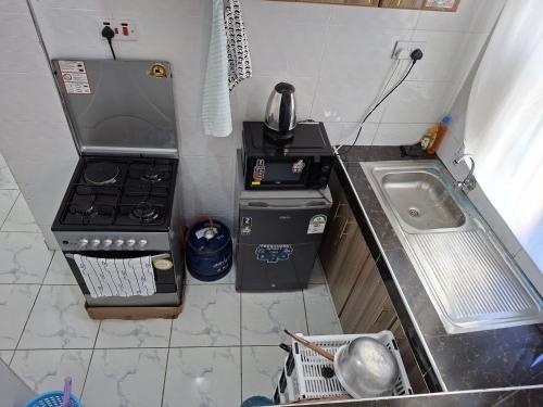 cozy 1bedroom mombasa bamburi near the beach with hot shower, Netflix, Secured parking 07&07 for 95 then 61to18, Mombasa (foto 4)