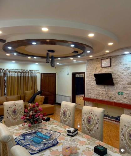 Shared lounge/TV area, Shahnoor Cottages Luxury Apartments, Changla Gali in Ayubia