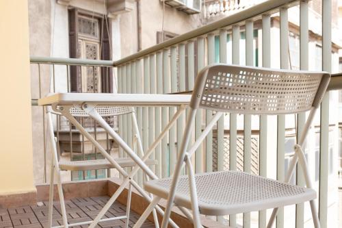 grey l studio apartments Downtown Cairo Ouzonian House in 카이로