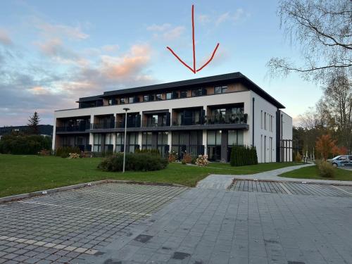 Sunny Albatross apartment with a balcony by the sea in Tīnūži