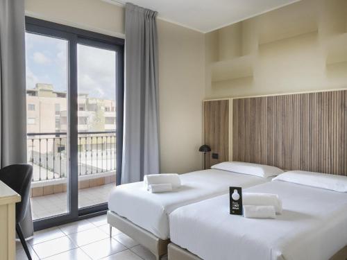 B&B Hotel Pomezia Cortese in โพเมซีอา