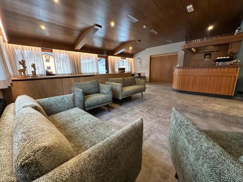 Delt lounge/TV-område, Hotel Ferrari in Pinzolo