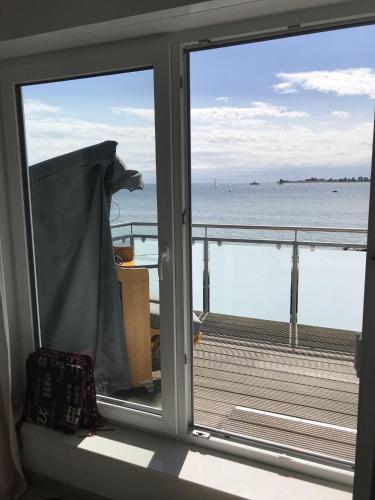 View, Strandhaus-Appartment-Rauchschwalbe in Fehmarnsund