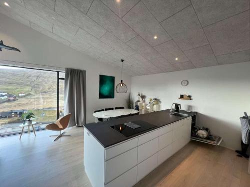 Modern 4BR Luxury Home with Ocean View & Jacuzzi in Sandavágur