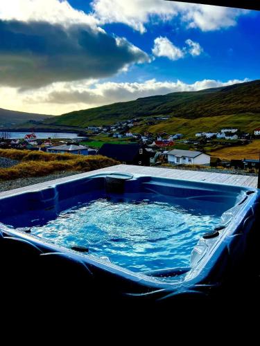 Modern 4BR Luxury Home with Ocean View & Jacuzzi in Sandavágur