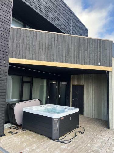 Modern 4BR Luxury Home with Ocean View & Jacuzzi in Sandavágur