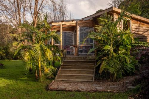 Exterior view, Sub-Tropical Paradise Retreat Willow Creek Cabin with Access to Sauna in Whangaroa